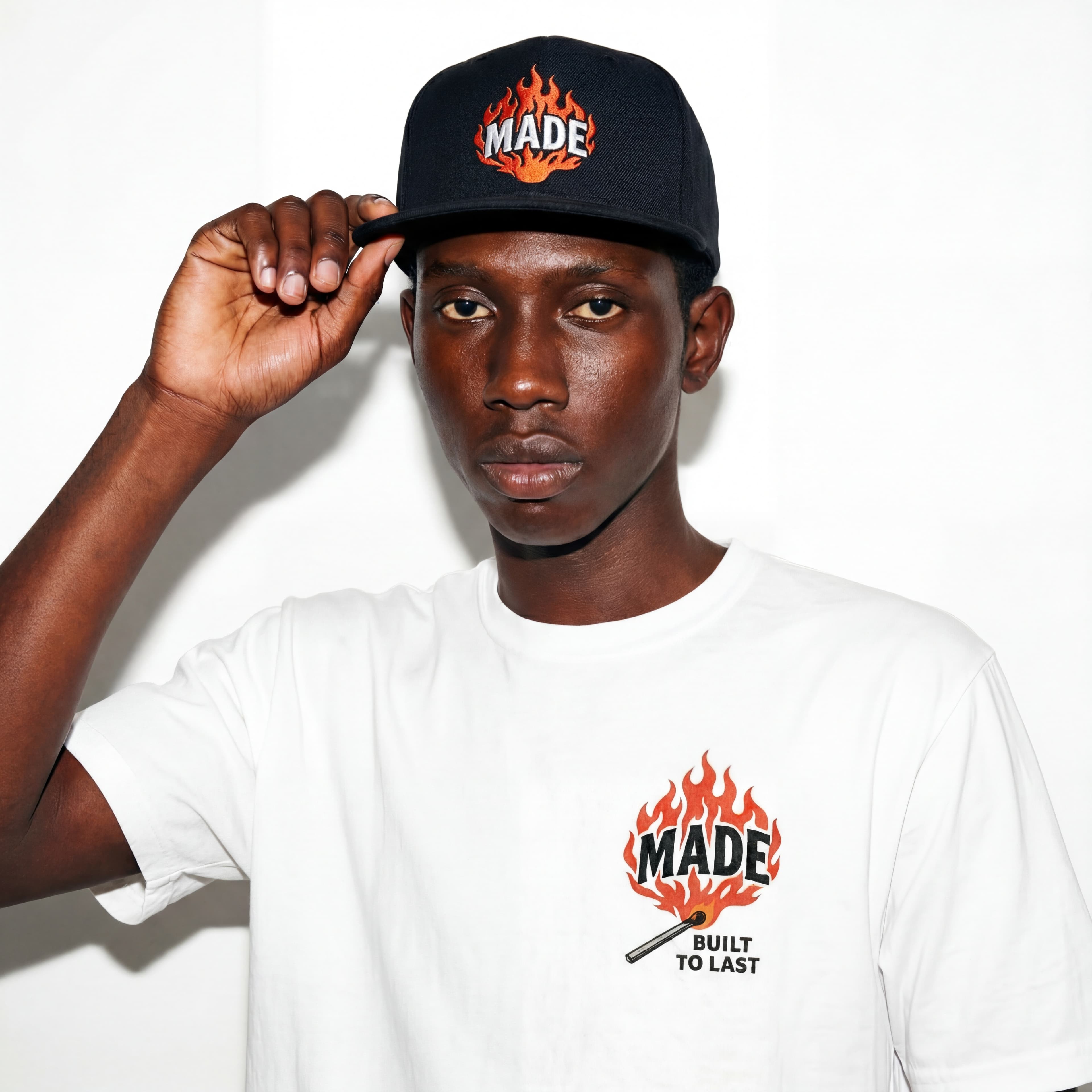 Creator wearing flame cap — FLYP Built to Last